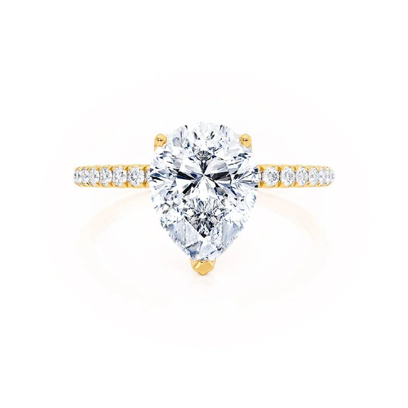 0.94 CT Pear Shaped Moissanite Solitaire Style Engagement Ring