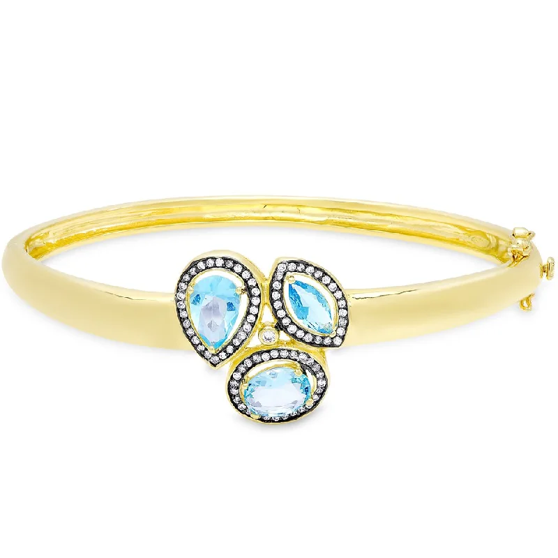 Samantha Stone Gold Over Sterling Silver Simulated Blue Topaz and Cubic Zirconia Three Stone Bangle