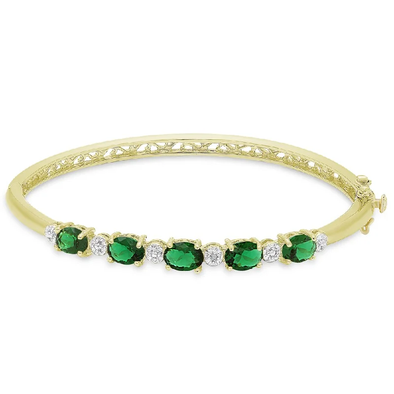 Dolce Giavonna Gold Overlay Simulated Emerald and Diamond Accent Bangle